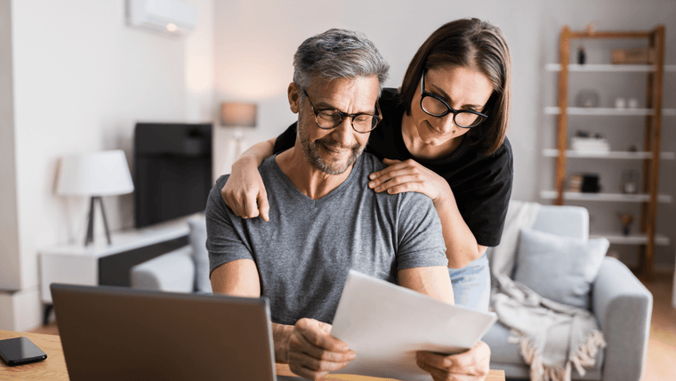Couple checking energy prices